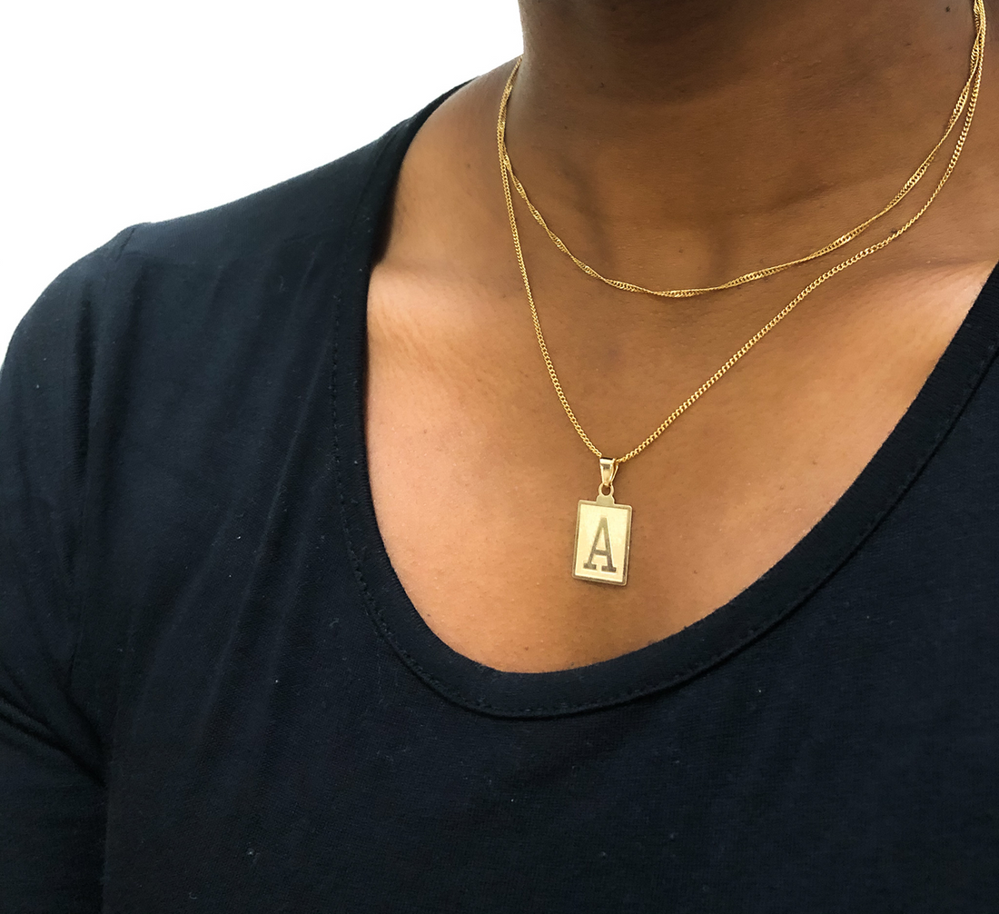 square initial necklace stacked